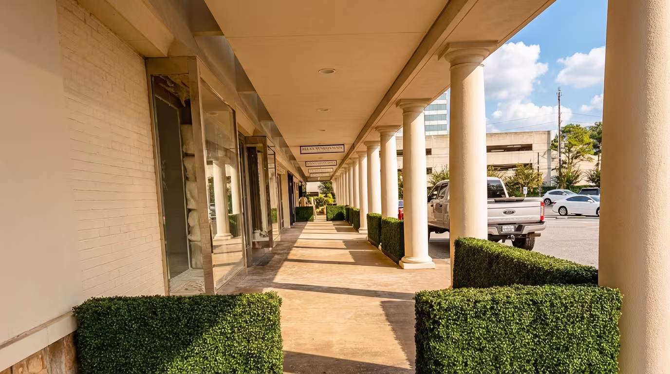 Concrete-mounted hedge barriers at Houston restaurant
